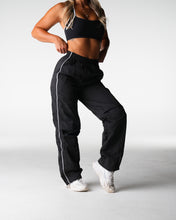 Load image into Gallery viewer, Black Stride Windbreaker Pants