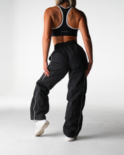 Load image into Gallery viewer, Black Stride Windbreaker Pants