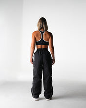 Load image into Gallery viewer, Black Stride Windbreaker Pants