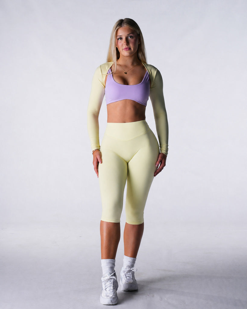 NVGTN AeraLite Capri Leggings - Limoncello |