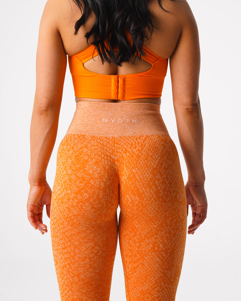 NVGTN Snakeskin Seamless Leggings - Burnt Orange |